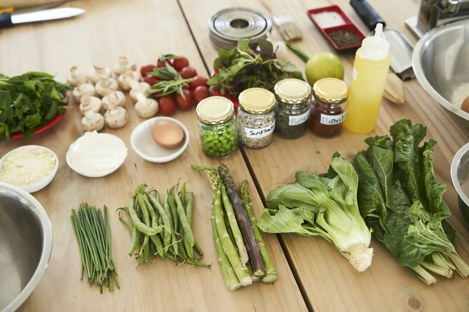 Fresh vegetables on a wooden kitchen table